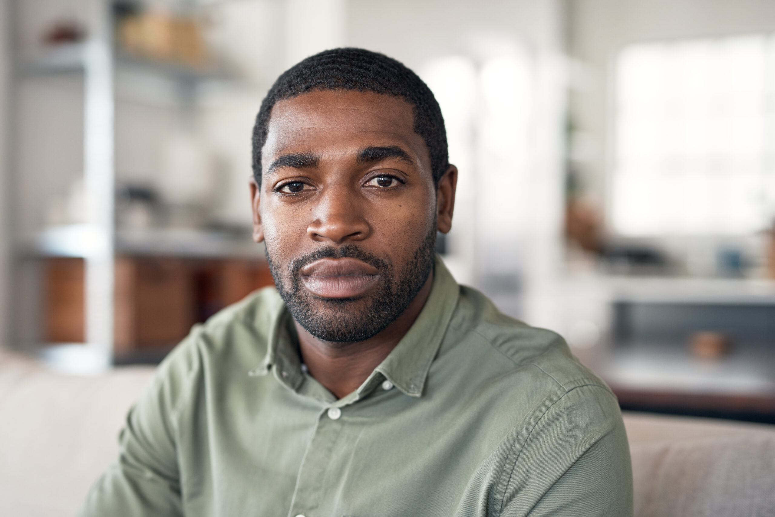 Young veteran looking at camera representing VA disability ratings explained