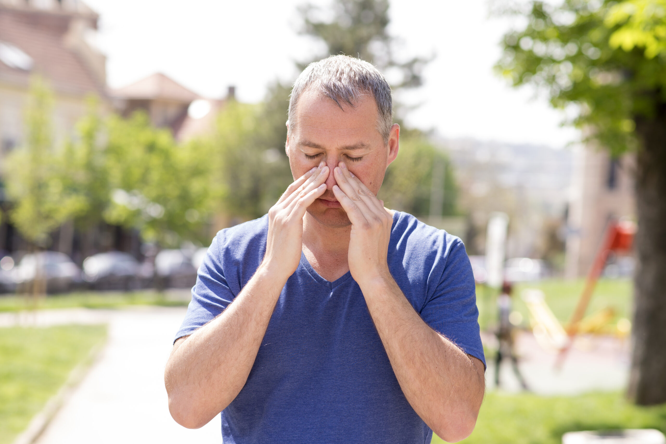 man experiencing sinus pressure VA respiratory disability rating symptoms